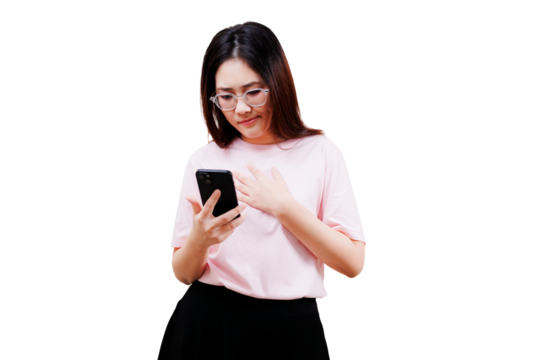 Asian young beautiful woman in a pink shirt looks at her smartphone with a thoughtful expression, placing her hand on her chest.