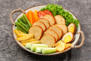 Selat Galantin is known for its combination of savory, sweet, and fresh flavors from its...