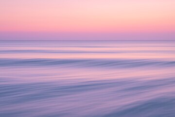 Obraz premium Soft pastel hues of a serene ocean sunrise or sunset