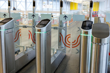 Metro station with modern gate. Fare collection system. Entrance gate of the subway station.