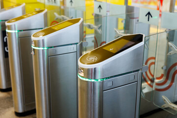 Metro station with modern gate. Fare collection system. Entrance gate of the subway station.