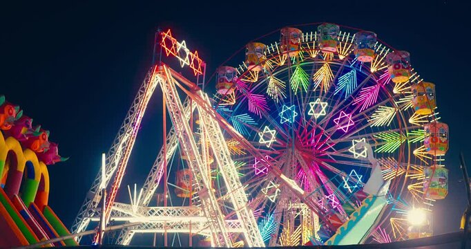Spinning Lights of the Fair &ndash; The Colorful Ferris Wheel at Night