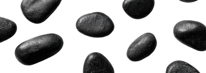 Scattered dark gray stones against a black background