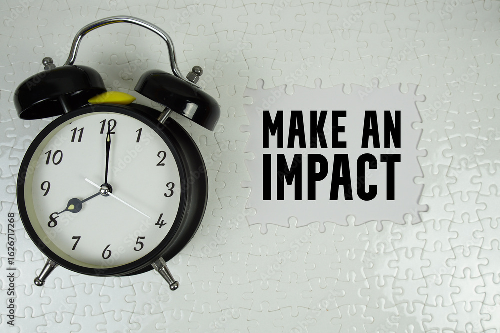 Poster make an impact text with alarm clock on white background