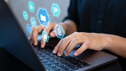 Person typing on laptop with digital icons hands