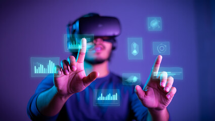 Person wearing virtual reality headset interacting with holographic data displays augmented reality technology