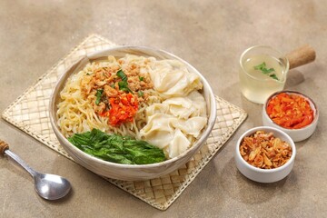 Mie Ayam Pangsit. Wonton Chicken Noodles are a type of wet noodle also known as 