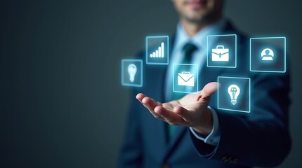 Businessman interacting with digital business icons