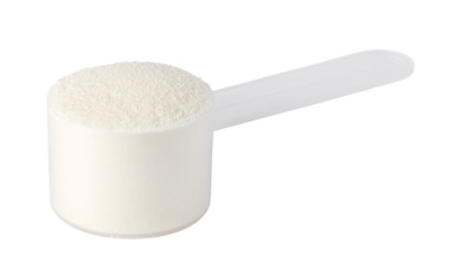 Plastic scoop overflowing with protein powder on transparent background