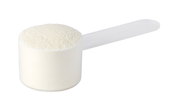 Plastic scoop overflowing with protein powder on transparent background