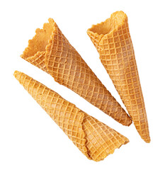 Three empty waffle ice cream cones falling on transparent background