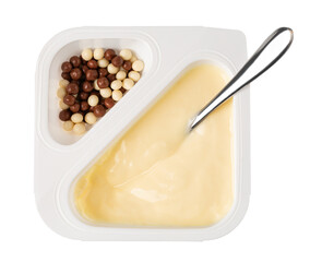 Creamy vanilla dessert with chocolate crispies in plastic container with spoon on transparent background