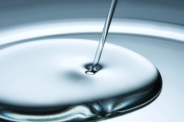 A very beautiful drop with an oily texture in blue tones.