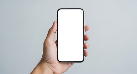 Hand holding a smartphone with blank white screen providing space for inserting relevant content for any modern application or brand presentation