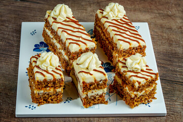 Homemade carrot cake slices with decorative frosting
