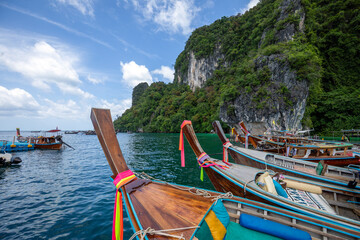 View of the paradise island of Koh Hong, Krabi, Thailand, with longtail boats in the harbor