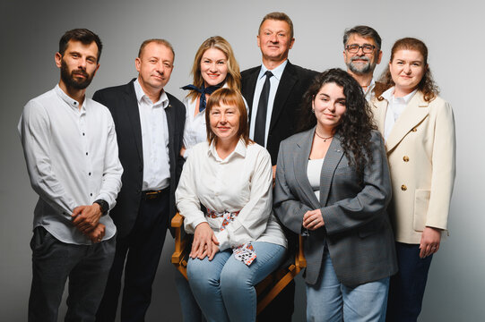 Business team posing for a group photo in studio