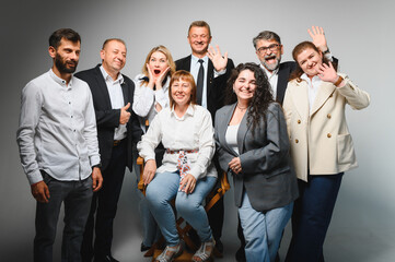 Business team celebrating success in meeting with leader
