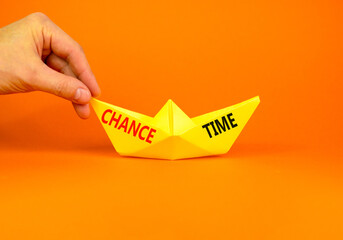 Chance time symbol. Concept word Chance time on beautiful yellow paper boat. Businessman's hand....