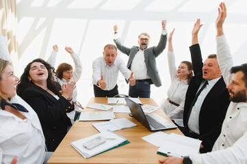 Business team celebrating success in meeting