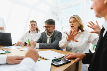 Business team engaging in a productive meeting, discussing strategies for success