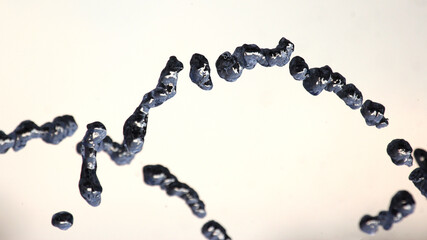 Details of a unique artistic creation featuring irregular shapes on a light background