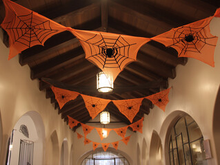 Halloween banners and spider web ceiling decor