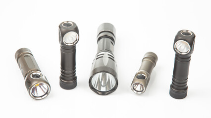 Diverse collection of flashlights showcasing different designs and features for various uses