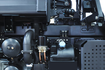 large engine with many tubes, bolts and various parts. Auto service concept background