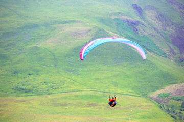 Spectacular paragliding adventure over the lush landscapes of Iceland's hills