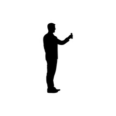 A bold, black silhouette of a man in business attire holding a small device, possibly a phone or tablet, against a pure white background.