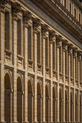 The elegant Stone Facade of the Grand Theatre Building in Bordeaux, France; Close-up