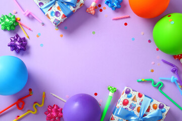 Colorful birthday party flat lay frame on purple background