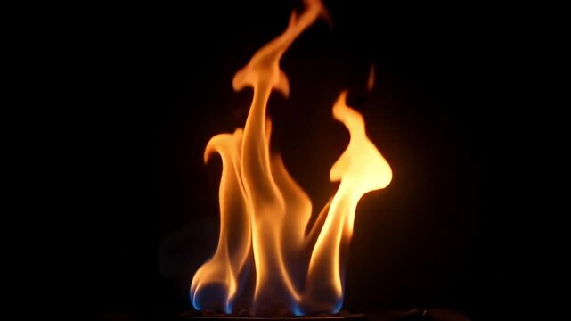 Captivating flame dance in the dark, a mesmerizing play of light and shadow, pure energy
