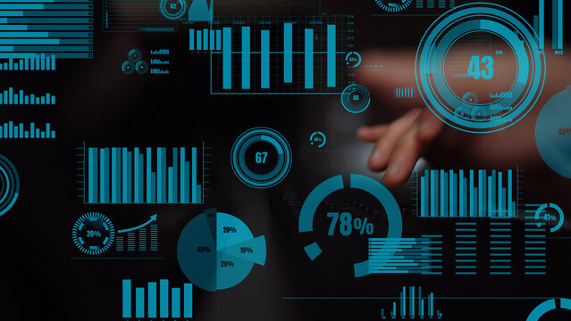 A close-up of hands interacting with digital graphs and charts, showcasing data visualization and analytics for business insights and informed decision making. Xenic