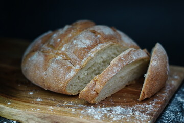 loaf of bread on wooden table