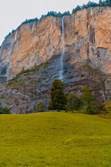 Staubbach Falls plunging from steep cliff in Lauterbrunnen Valley