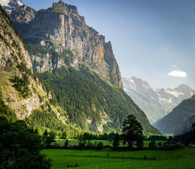 Panoramic view of Lauterbrunnen Valley with mountain peaks and alpine road