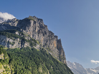 Panoramic view of Lauterbrunnen Valley with mountain peaks and alpine road