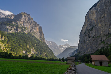 Panoramic view of Lauterbrunnen Valley with mountain peaks and alpine road