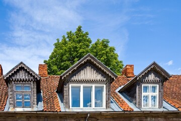 Attic Windows of an Old Wooden House
