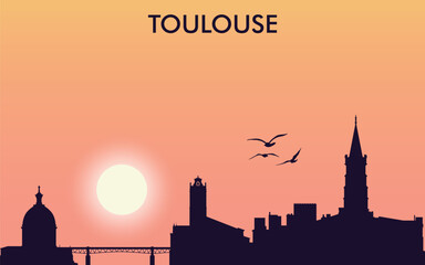 Fototapeta premium The image shows the silhouette of Toulouse against the sunset. Dome, tower, bridge, birds in the sky. The text TOULOUSE is on top.