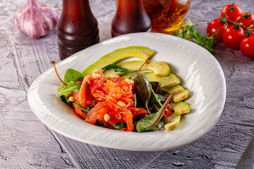Dietary salad with salmon and avocado