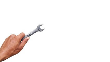 Hand Holding an Old Iron Wrench