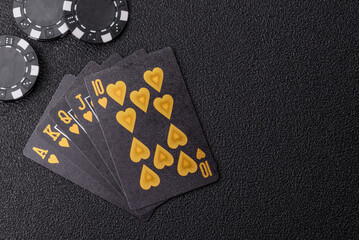 Playing card game poker in casino with chips, bets and risk. Cards and chips on elt