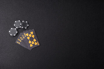 Playing card game poker in casino with chips, bets and risk. Cards and chips on elt