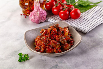 Roasted chicken hearts with vegetables
