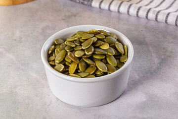 Fresh green pumpkin peeled seeds