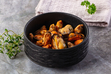 Peeled mussels heap in the bowl
