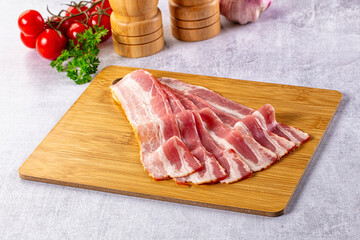 Raw bacon pork meat slices